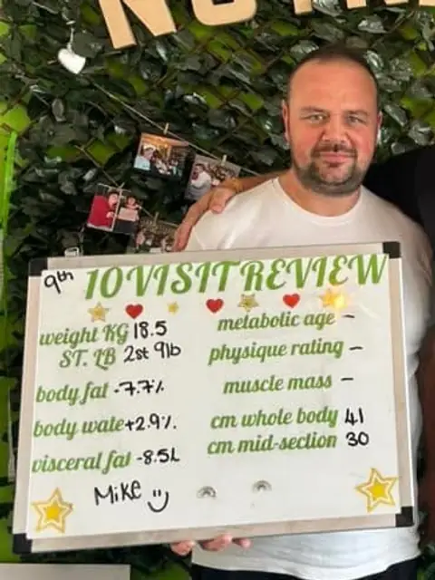 A man at the Willerby club shows off his assessment board